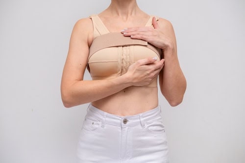 Woman,Patient,In,Post,Surgical,Compression,Bra,,Implants